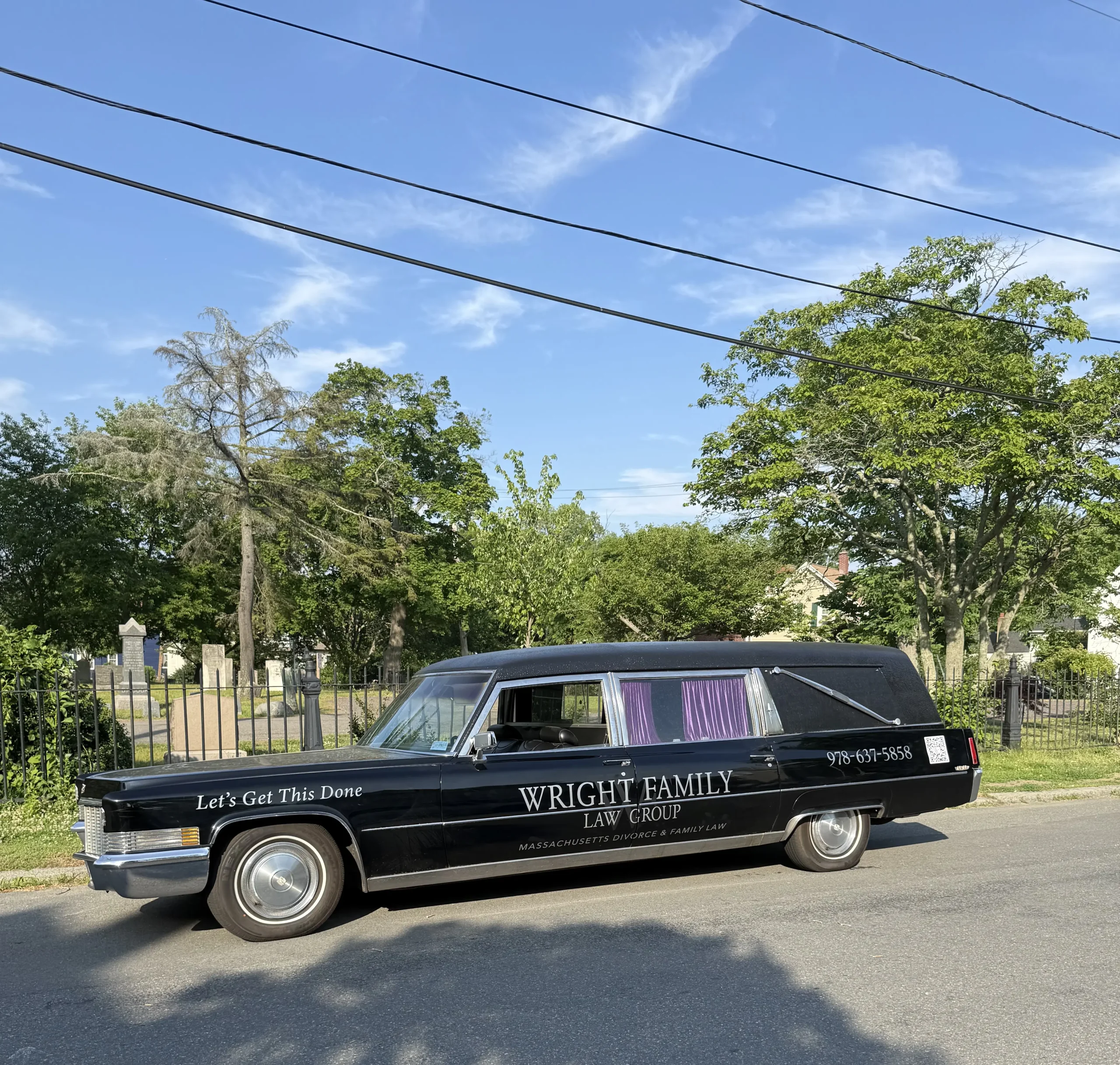 Morticia on the road near a cemetery